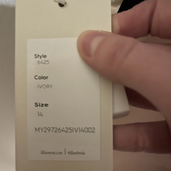 Brand new, never worn unaltered wedding dress! - Picture 4 of 4